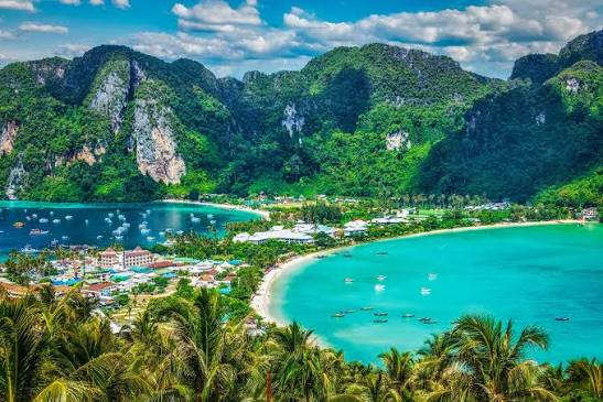 Thailand vacation package — longtail boat at Phi Phi Islands, Thailand